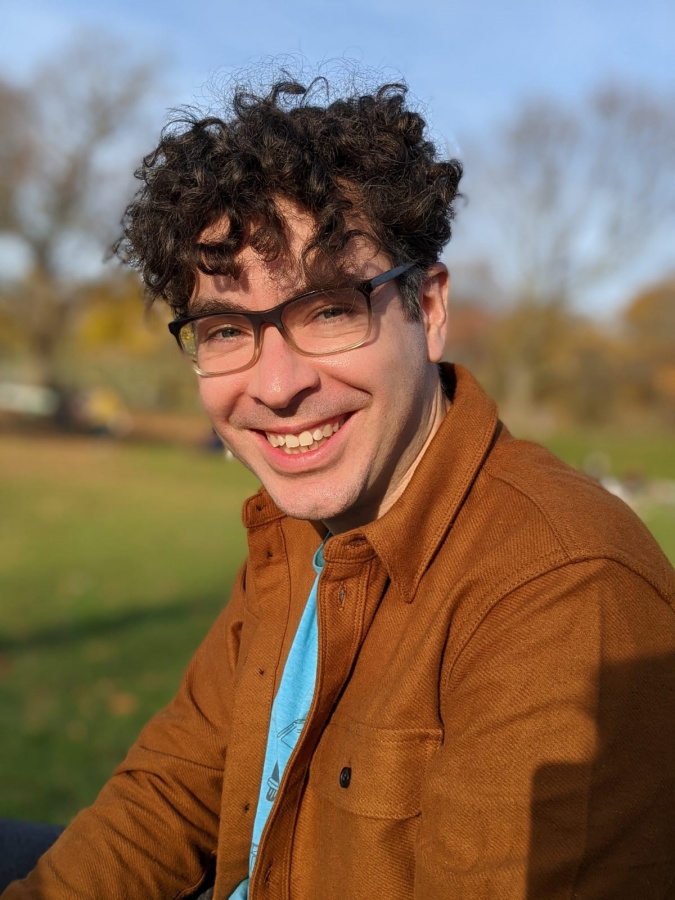 Igor Grossmann smiling outdoors