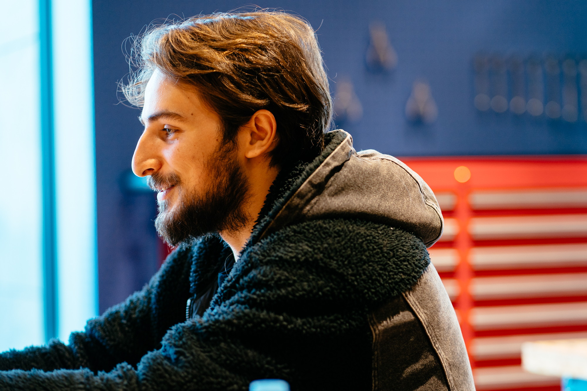 Peppe smiling as he answers interview questions